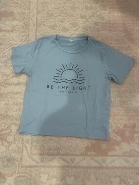 SHEIN Light Blue Graphic Tee "Be The Light"